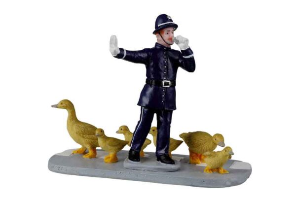Policía dirigiendo a los patos Lemax