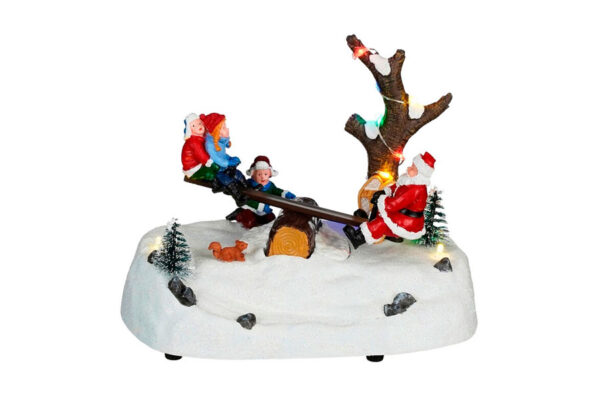 Columpio en la nieve con Papá Noel