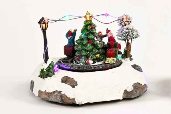 Tren de Navidad alrededor del Árbol